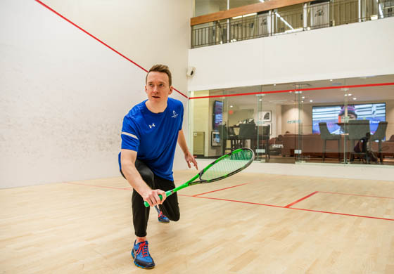 Laurence, our head squash pro, on the squash court at the Adelaide Club