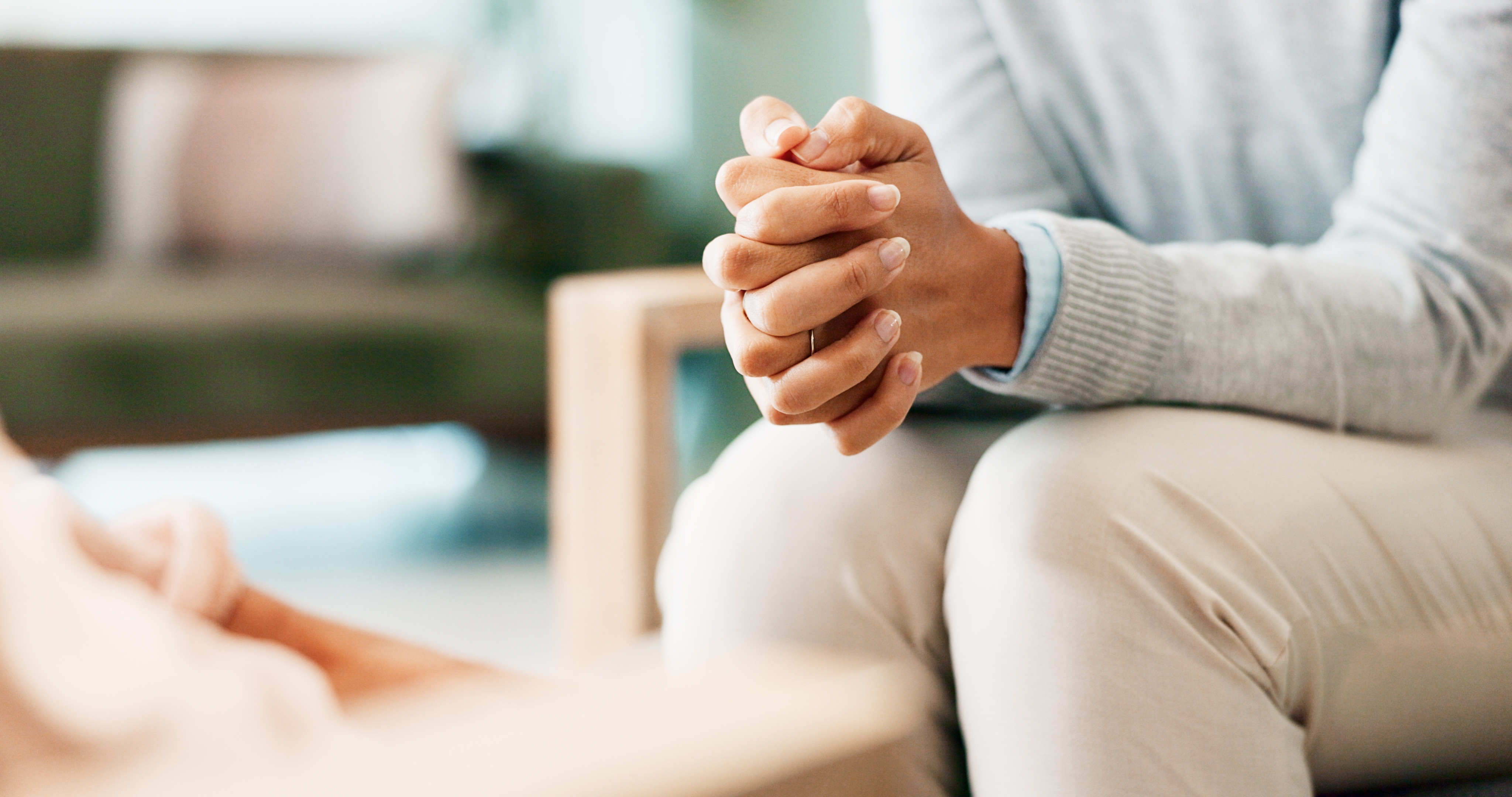 Healthcare consultation discussing persistent shoulder pain, mobility concerns, and treatment options related to menopause and frozen shoulder.